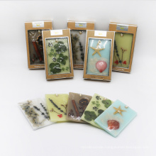 scented wax hanging sachet with nature decoration in kraft box